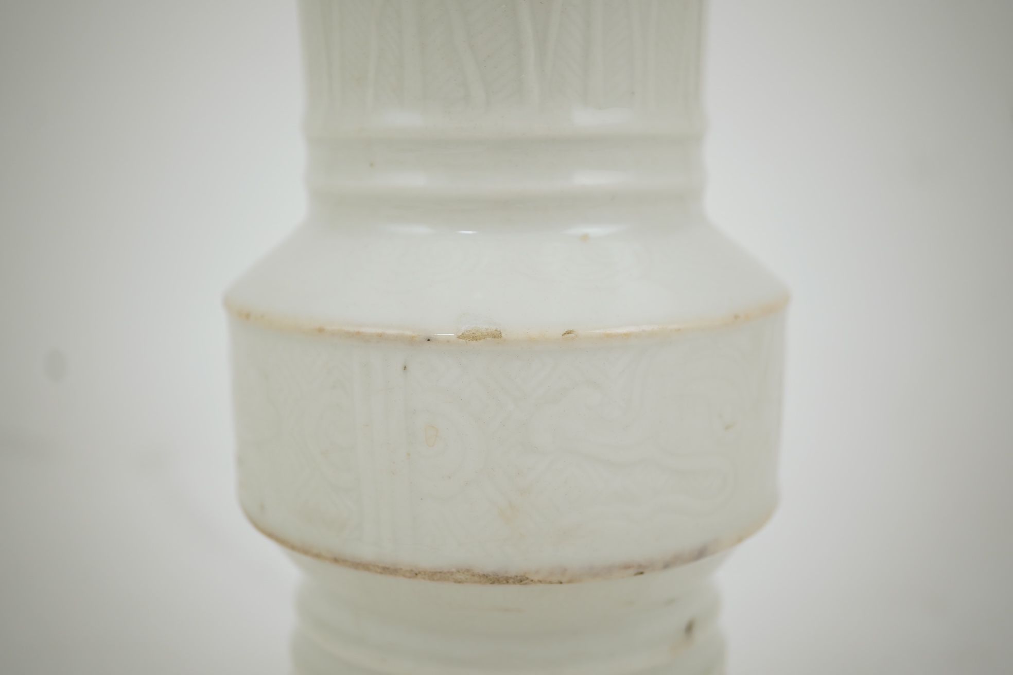 A Chinese white glazed 'gu' vase, 19th century